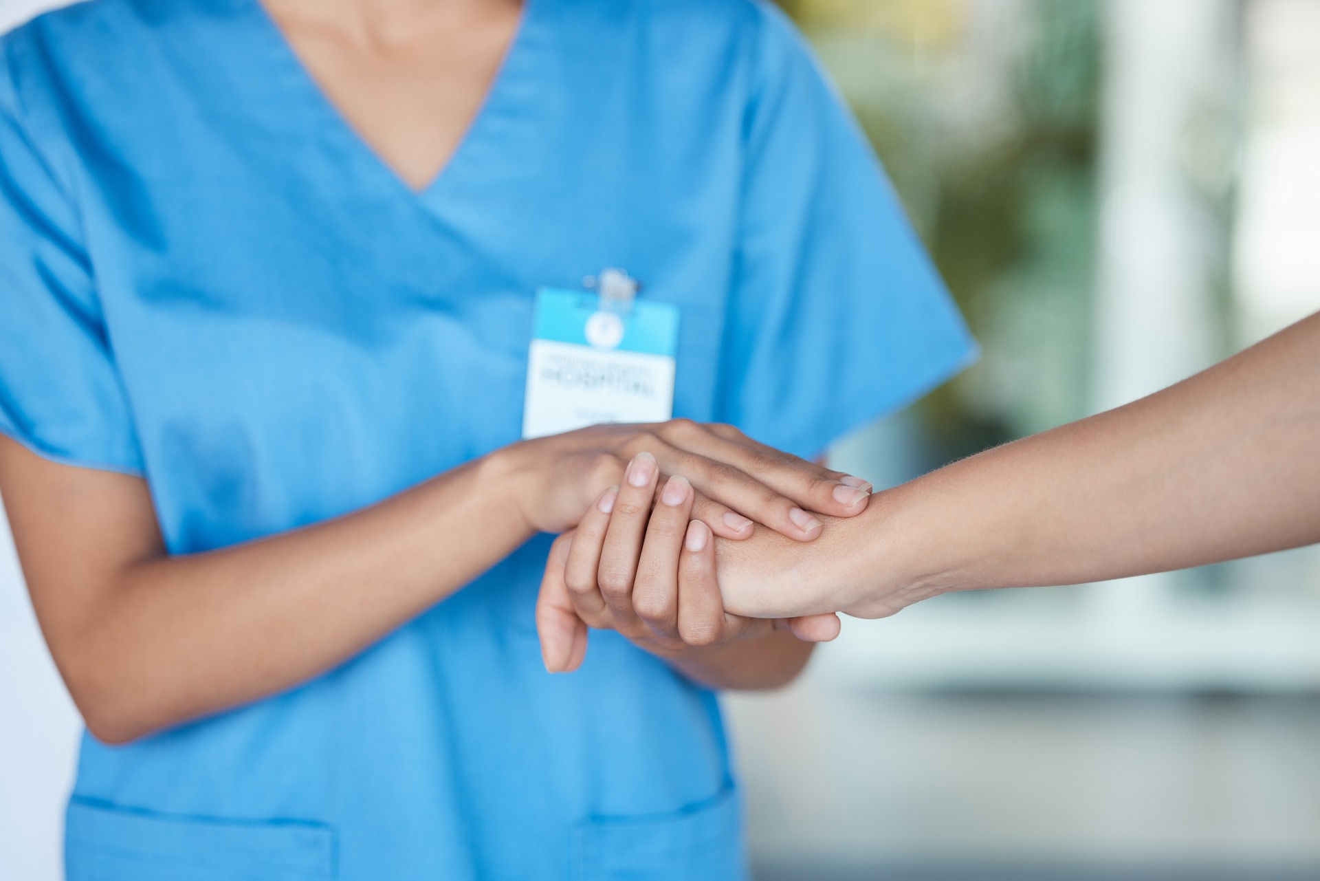 Shot of a nurse comforting a patient